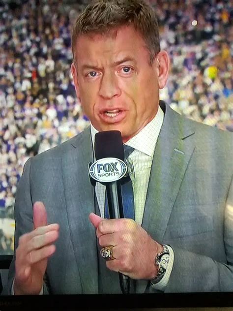 Troy Aikman wearing a DaytonaC 